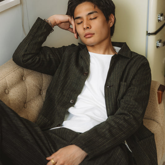 C1018 White styling reference: the long-sleeve T-shirt worn under a dark jacket.