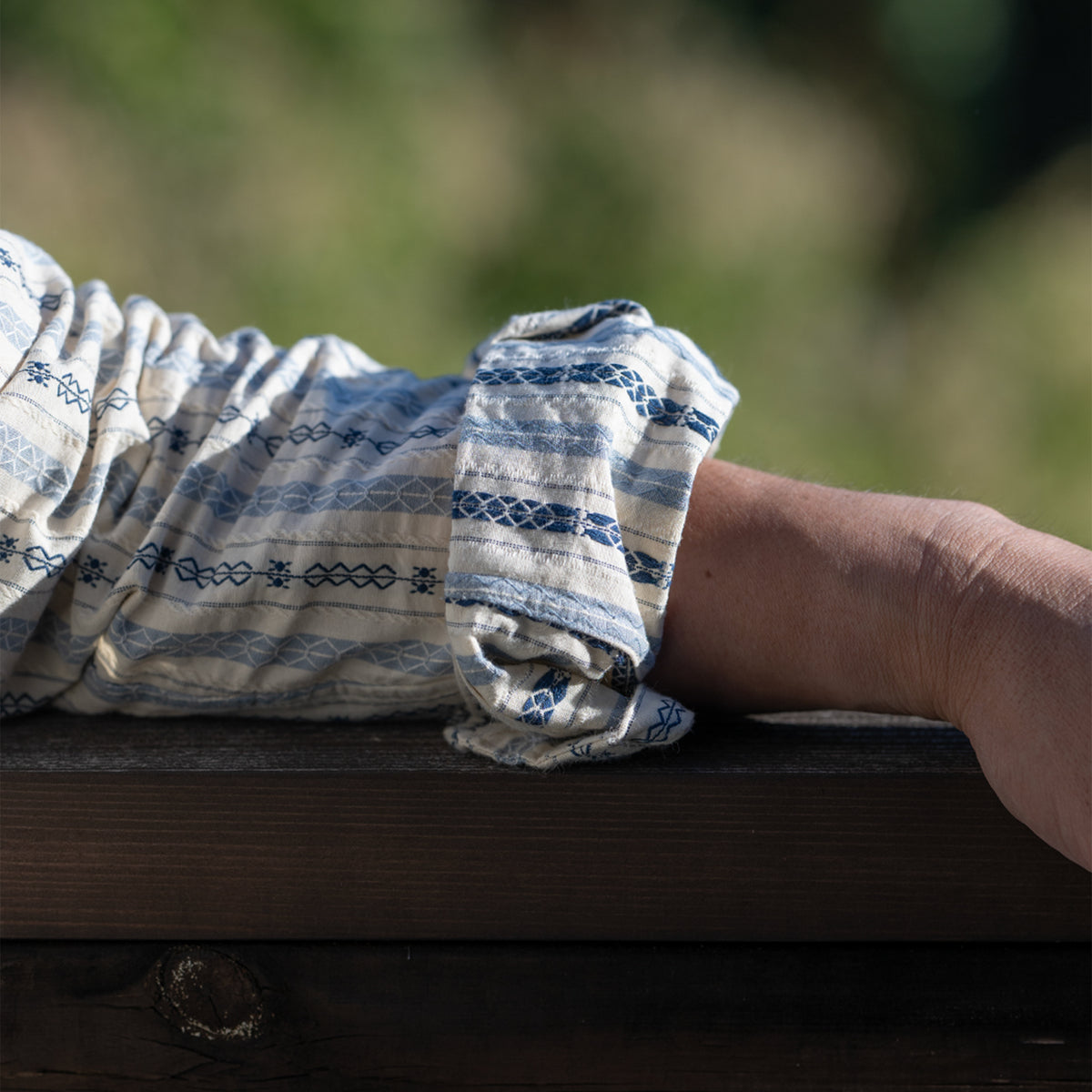 PREQUEL S1023 Classic Stripe Work Shirt (Beige), close-up of the sleeve and cuff on a model.